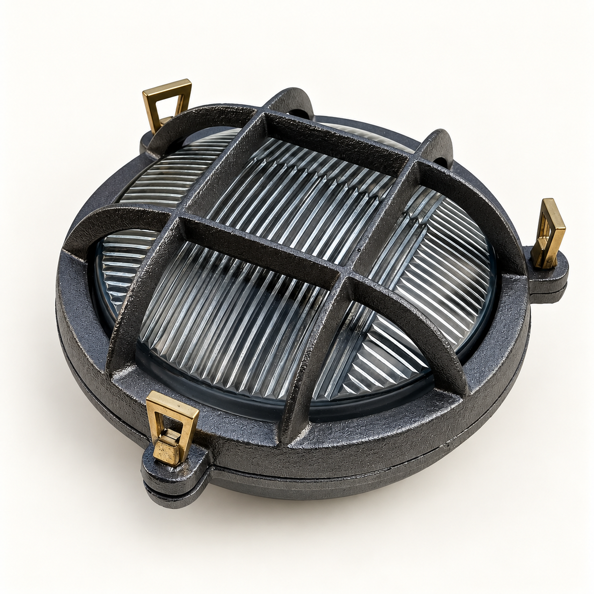 A round dark grey cast marine light fixture with a protective cage grille and brass mounting hardware, shown on a clean white background.