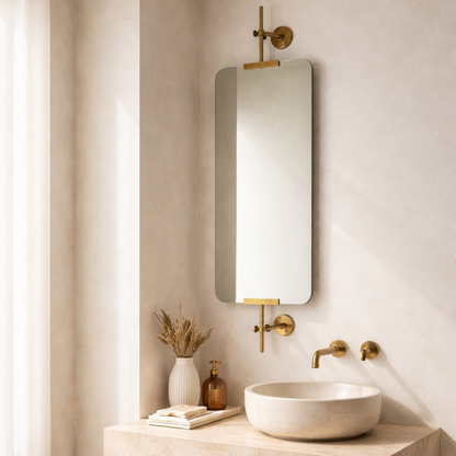 Bathroom corner with a sink, mirror, and decorative elements.